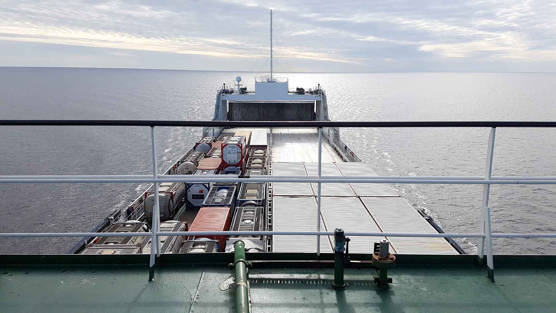 big ship sailing into the horizon
