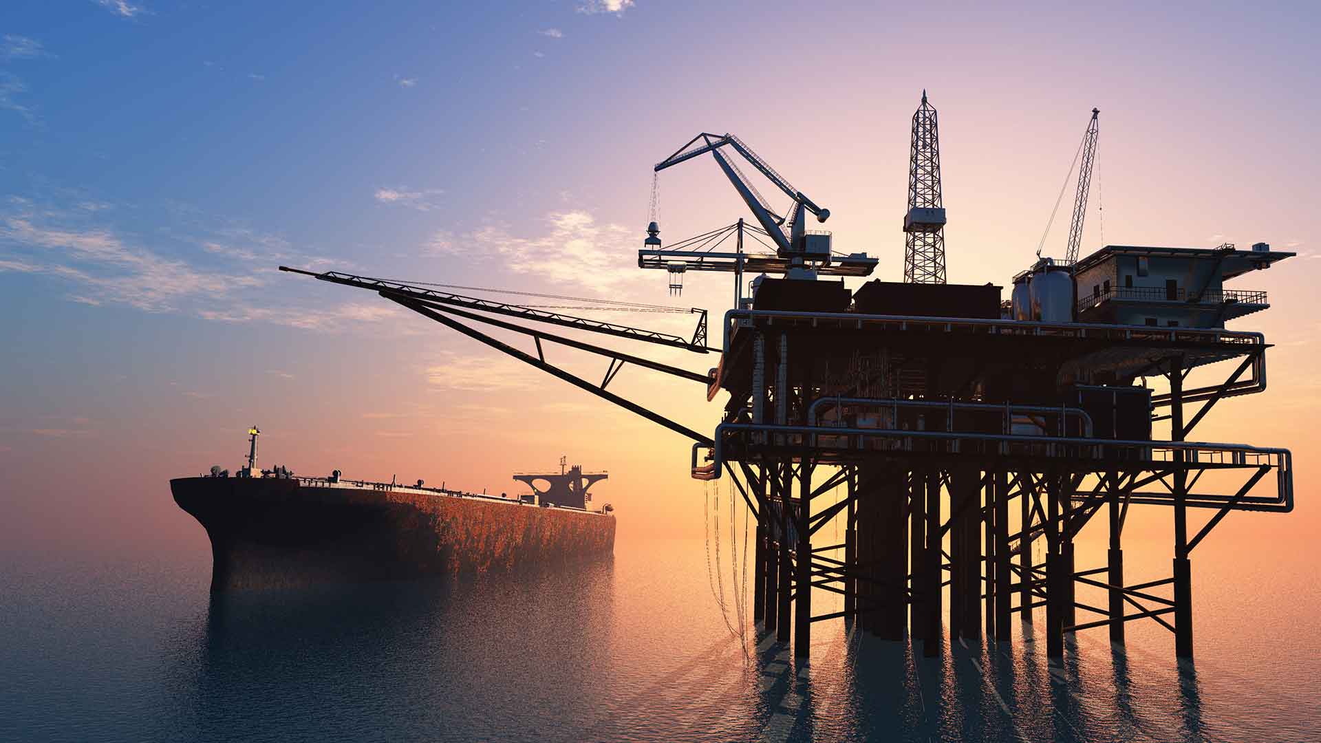 oil rig and ship in the sunset